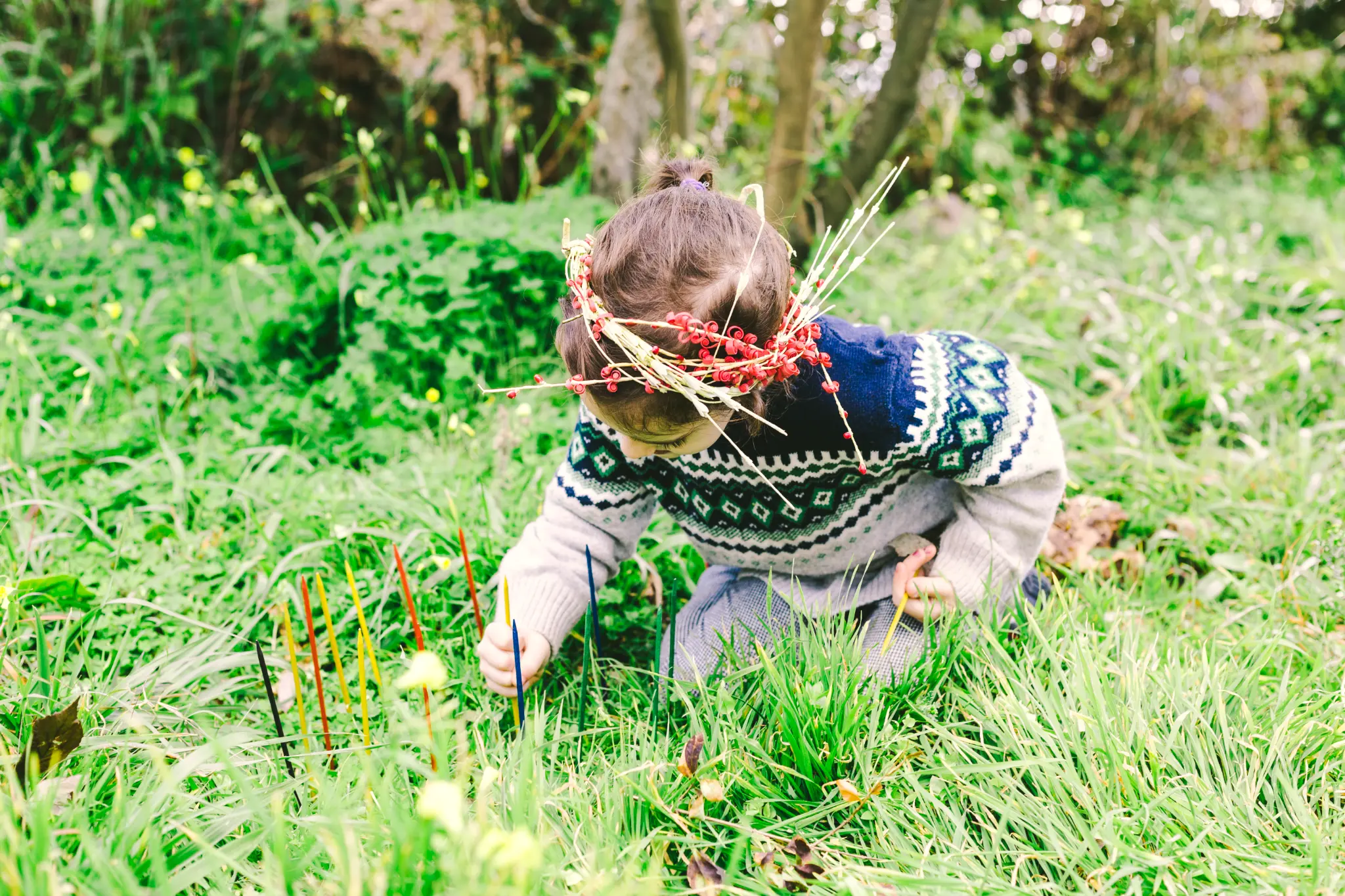 Child making nature crafts