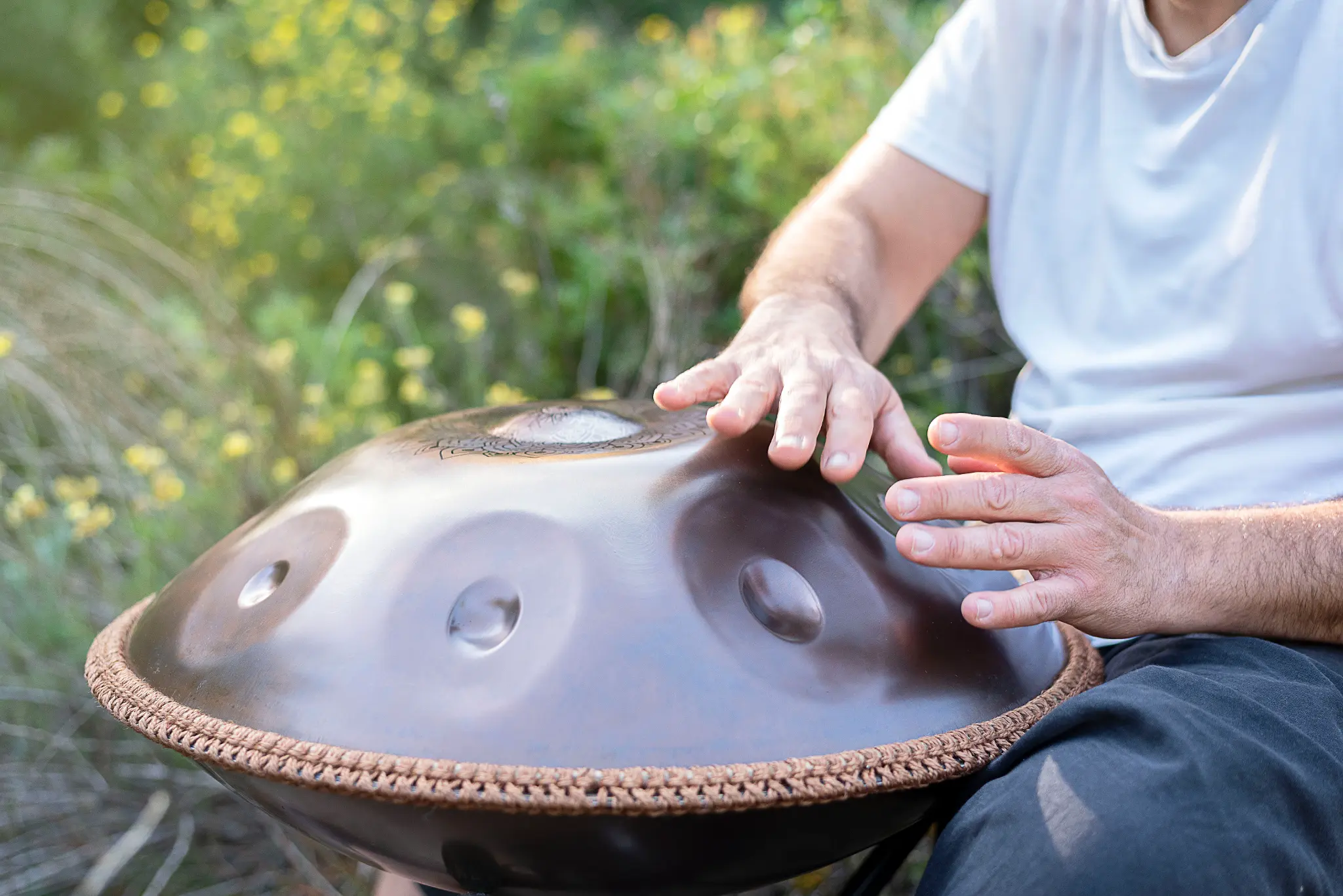 Playing handpan music in nature